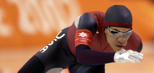 Steve Griffin | Tribune file photo
Speedskater Derek Parra of the United States powers to a world record and gold medal in the men's 1,500 meters at the Utah Olympic Oval.