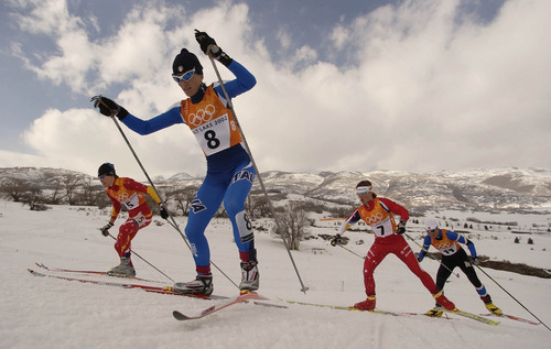 Francisco Kjolseth | Tribune file photo
Skiers race up a hill in the consolation final of the women's cross country sprint at Soldier Hollow.