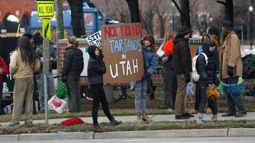 Steve Griffin  |  The Salt Lake Tribune

Members of the environmental group Earth First! protest Monday,Feb. 20, 2012, outside the Utah State Trust Lands Administration offices in Salt Lake City. The group is protesting the development of tar sands in the Book Cliffs area of Utah.