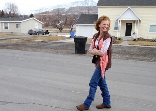 Rick Egan  | The Salt Lake Tribune 

Debra Brown walks along the street in the neighborhood where she was born, in Richmond, Utah. Friday, February 17, 2012. Brown was released from prison last May, after being found 