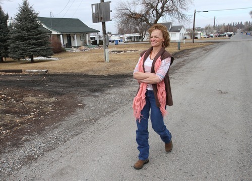 Rick Egan  | The Salt Lake Tribune 

Debra Brown walks along the street in the neighborhood where she was born, in Richmond, Utah. Friday, February 17, 2012. Brown was released from prison last May, after being found 