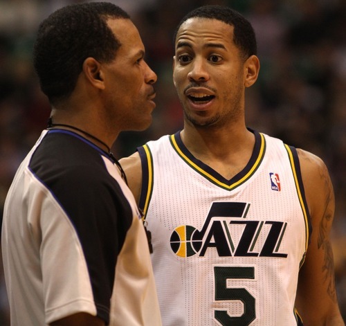 Rick Egan  | The Salt Lake Tribune 

Utah Jazz point guard Devin Harris (5) has a few words with the referee, in NBA action in Salt Lake City, Monday, February 20, 2012.