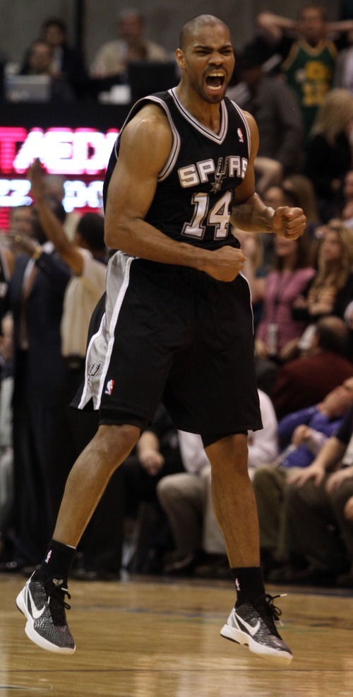 Rick Egan  | The Salt Lake Tribune 

San Antonio Spurs point guard Gary Neal (14) celebrates as the Spurs sunk a three-point shot, giving them a 4-point lead, with seconds left in the game,  in NBA action in Salt Lake City, Monday, February 20, 2012.