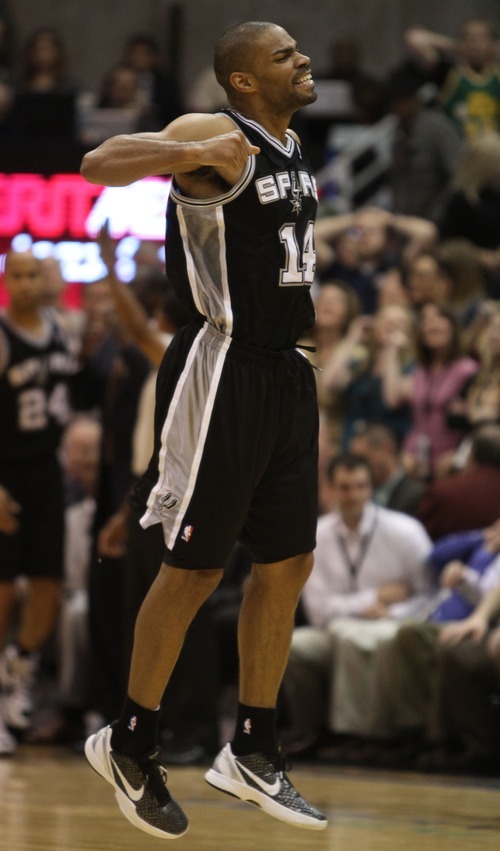 Rick Egan  | The Salt Lake Tribune 

San Antonio Spurs point guard Gary Neal (14) celebrates as the Spurs sunk a three-point shot, giving them a 4-point lead, with seconds left in the game,  in NBA action in Salt Lake City, Monday, February 20, 2012.