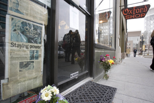 Paul Fraughton | The Salt Lake Tribune.
Flowers are left in front of the Oxford Shop in downtown Salt Lake city in honor of the store's owner Dick Wirick, who was killed this morning when he was struck by a bus.
 Tuesday, February 21, 2012