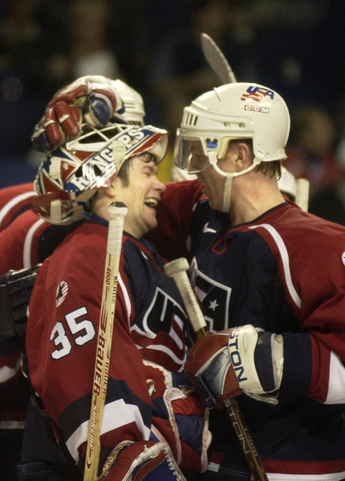 Ryan Galbraith | Tribune file photo
Americans Brian Leetch and goalkeeper Mike Richter (35) celebrate after beating Russia 3-2 in a men's hockey semifinal at the E Center in West Valley City, to earn a shot at rival Canada in the gold-medal game.
