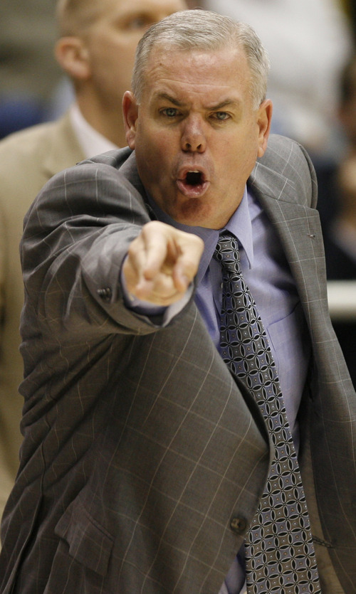 Rick Egan  | The Salt Lake Tribune 

Brigham Young Cougars head coach Dave Rose shouts directions to his players, in second half action, BYU vs. St Mary's in the Marriott Center in Provo, Saturday, January 28, 2012.