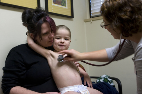 Al Hartmann  |  The Salt Lake Tribune
Intermountain Healthcare pediatrician Lisa Palmieri checks Kyler's lungs. The 4-year-old has survived multiple surgeries to repair his malformed heart and is vulnerable to colds. Palmieri is more than a doctor, says Kyler's mom, Nicole Westmoreland. 