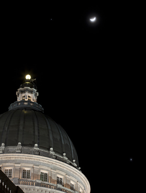 Lennie Mahler  |  The Salt Lake Tribune
Jupiter, left, the moon and Venus, bottom-right, shine in the night sky above the capitol building on Sunday, Feb. 26, 2012.