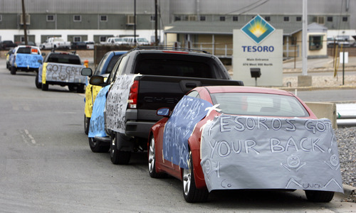 Francisco Kjolseth  |  The Salt Lake Tribune
Multiple wrapped vehicles express worker sentiment on Monday, February 27, 2012, at Tesoro Corp.'s Salt Lake City refinery who have rejected the company's contract offer.