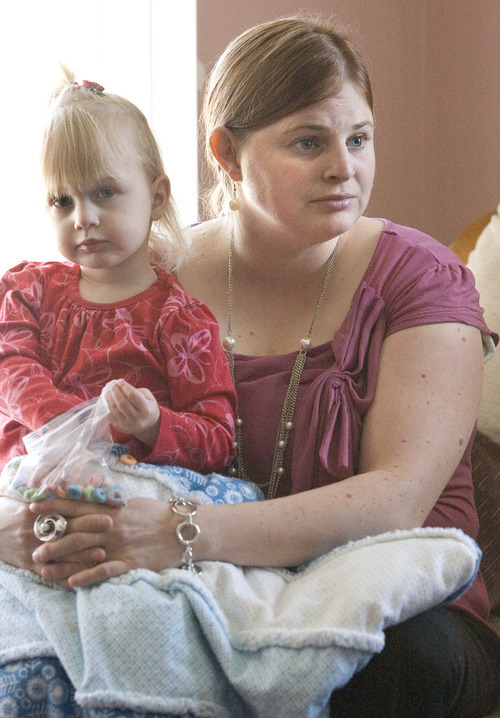 Paul Fraughton | The Salt Lake Tribune.
Camilla Grondahl holds her daughter Chloe as she talks about the genetic mutation she has in common with her mother that caused her infant son Max to be born with what is now named Ogden Syndrome.
 Tuesday, February 14, 2012