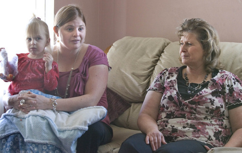 Paul Fraughton | The Salt Lake Tribune.
Camilla Grondahl, holding her daughter Chloe, and Camilla's mother Halena Black, talk about the genetic mutation in their family causing what is now termed Ogden Syndrome. The syndrome led to the early deaths of male babies in the family.
 Tuesday, February 14, 2012