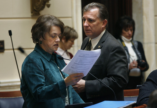 Scott Sommerdorf  |  Tribune File Photo             
Sen. Margaret Dayton, R-Orem, denies allegations she is holding bills hostage in retaliation for an amendment made to one of her bills. One of the bills locked up in her Senate Rules Committee would criminalize hit-and-run accidents by boaters. In this photo from on the Senate floor earlier this month, Dayton confers with Sen. Curt Bramble, R-Provo.