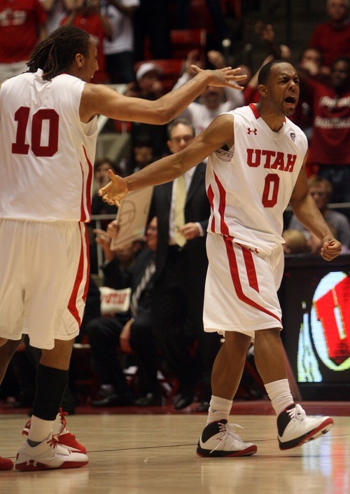 Kim Raff  |  The Salt Lake Tribune
University of Utah player Chris Hines celebrates scoring three points late in the second half and taking the lead over Stanford at the Huntsman Center in Salt Lake City, Utah on February 25, 2012.  Utah went on to win the game 58-57.
