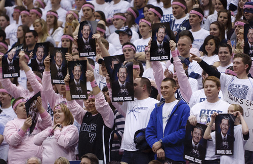 Trent Nelson  |  The Salt Lake Tribune
BYU fans hold up signs reading, 