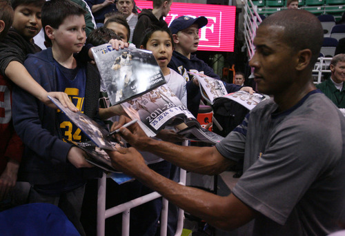 Steve Griffin  |  The Salt Lake Tribune

Jazz player Raja Bell signs autographs before game against the Houston Rockets at EnergySolutions Arena in Salt Lake City, Utah  Wednesday, February 29, 2012.