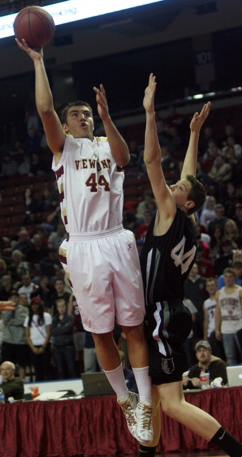 Kim Raff  |  The Salt Lake Tribune
Viewmont player Haden Heath takes a shot as Riverton player Richard Worsham defends during the 5A UHSAA State Tournament at the Maverick Center in Salt Lake City, Utah on February 28, 2012.  Riverton went on to win the game 52-21 in double overtime.
