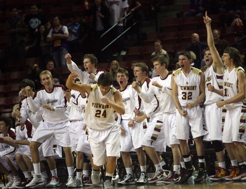 Kim Raff  |  The Salt Lake Tribune
Viewmont celebrates Brody Bagshaw as he scores three points in the last few seconds of overtime during a game against Riverton for the 5A UHSAA State Tournament at the Maverick Center in Salt Lake City, Utah on February 28, 2012. Riverton went on to win the game 52-21 in double overtime.