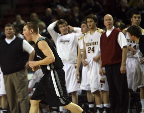 Kim Raff  |  The Salt Lake Tribune
Riverton player D Mccleary cheers as his team maintains a lead over Viewmont in the last few seconds of overtime during the 5A UHSAA State Tournament at the Maverick Center in Salt Lake City, Utah on February 28, 2012. Riverton went on to win the game 52-21 in double overtime.