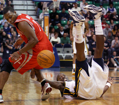 Steve Griffin  |  The Salt Lake Tribune

Utah's Josh Howard falls to the ground after knocking the ball away form Houston's Kyle Lowry during first half action in the Jazz Rockets game at EnergySolutions Arena in Salt Lake City, Utah  Wednesday, February 29, 2012.