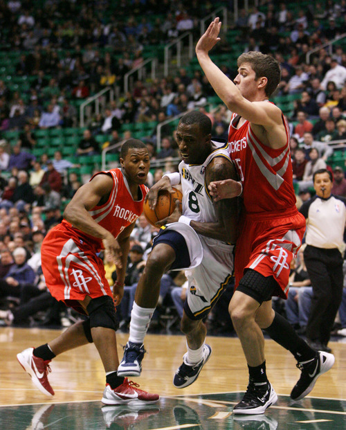 Steve Griffin  |  The Salt Lake Tribune

Utah's Josh Howard lowers his shoulder as he tries to get past Houston's Chandler Parsons during first half action in the Jazz Rockets game at EnergySolutions Arena in Salt Lake City, Utah  Wednesday, February 29, 2012.