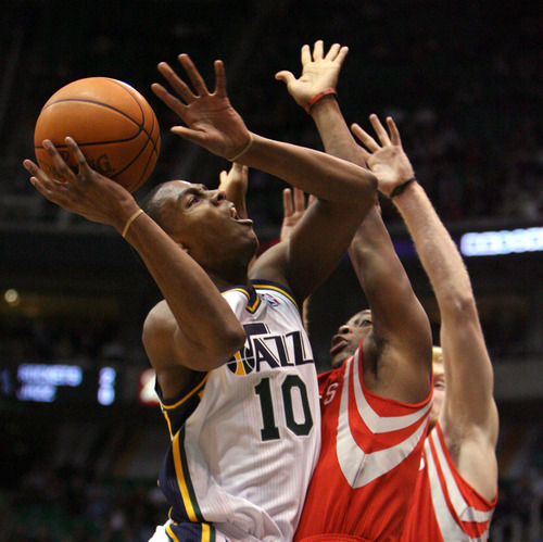 Steve Griffin  |  The Salt Lake Tribune

Utah's Alec Burks tries to get a shot off against the Houston defense during first half action in the Jazz Rockets game at EnergySolutions Arena in Salt Lake City, Utah  Wednesday, February 29, 2012.