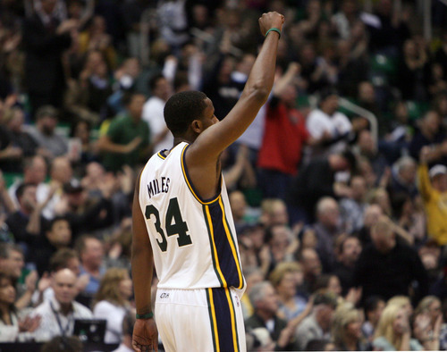 Steve Griffin  |  The Salt Lake Tribune

Utah's C.J. Miles holds his and up after scoring two points during second half action in the Jazz Rockets game at EnergySolutions Arena in Salt Lake City, Utah  Wednesday, February 29, 2012.