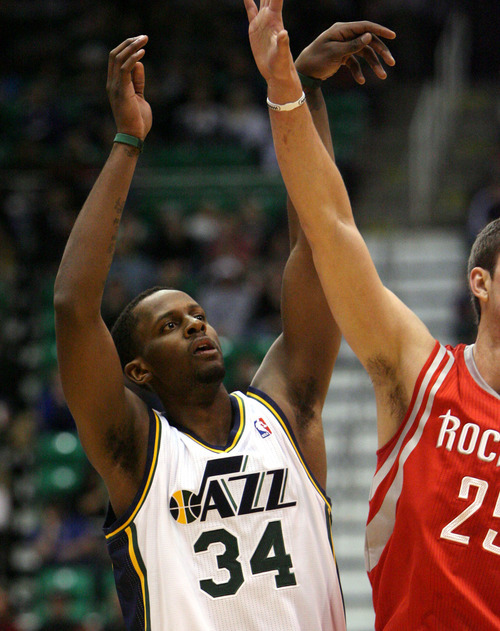 Steve Griffin  |  The Salt Lake Tribune

Utah's C.J. Miles follows through on his shot during first half action in the Jazz Rockets game at EnergySolutions Arena in Salt Lake City, Utah  Wednesday, February 29, 2012.