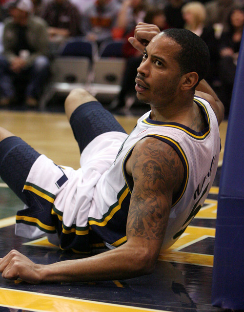 Steve Griffin  |  The Salt Lake Tribune

Utah Jazz guard Devin Harris stares at the referee after getting knocked to the ground during first half action in the Jazz Rockets game at EnergySolutions Arena in Salt Lake City, Utah  Wednesday, February 29, 2012.