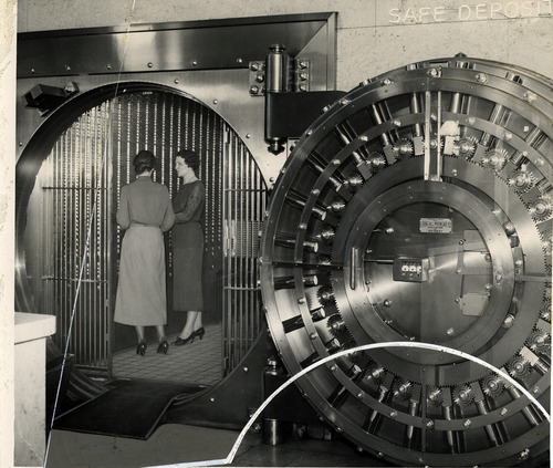 Tribune file photo

Women are seen in the safe deposit vault at Walker Bank in 1937.
