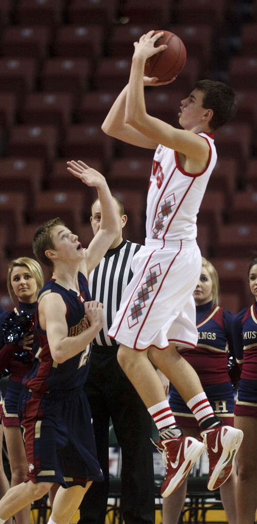 Trent Nelson  |  The Salt Lake Tribune
Bountiful's Zach Seljaas shoots over Herriman's Brady Beard. Bountiful vs. Herriman, 4A High School Basketball Championships Wednesday, February 29, 2012 at the Maverik Center in West Valley City, Utah.