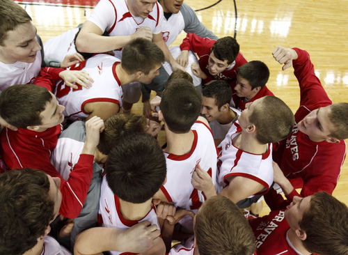 Trent Nelson  |  The Salt Lake Tribune
Bountiful players huddle pre-game.  Bountiful vs. Herriman, 4A High School Basketball Championships Wednesday, February 29, 2012 at the Maverik Center in West Valley City, Utah.