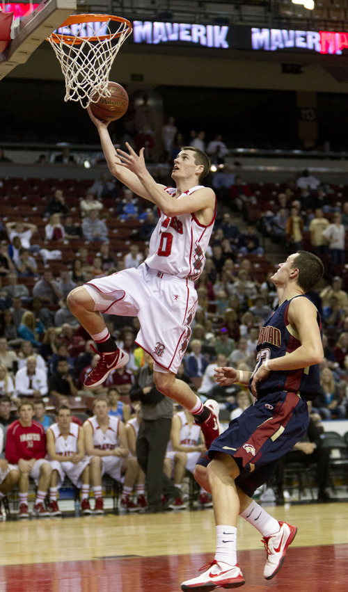 Trent Nelson  |  The Salt Lake Tribune
Bountiful's Brit Harding shoots, with Herriman's Jaden Rasmussen at right. Bountiful vs. Herriman, 4A High School Basketball Championships Wednesday, February 29, 2012 at the Maverik Center in West Valley City, Utah.