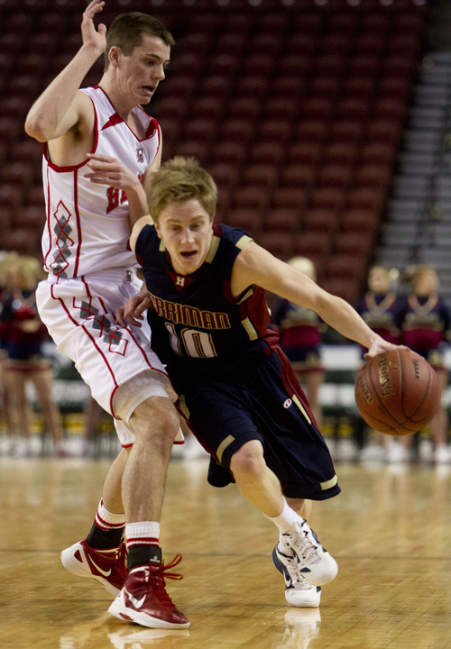 Trent Nelson  |  The Salt Lake Tribune
Herriman's Tanner McKissick drives past Bountiful's Brit Harding. Bountiful vs. Herriman, 4A High School Basketball Championships Wednesday, February 29, 2012 at the Maverik Center in West Valley City, Utah.