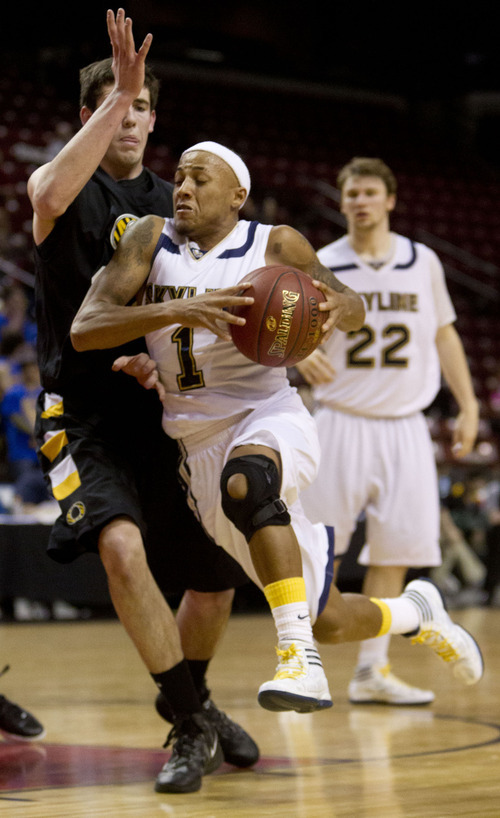 Trent Nelson  |  The Salt Lake Tribune
Skyline's Desean Miller drives to the basket, defended by Orem's Josh Pollard. Orem vs. Skyline, 4A High School Basketball Championships Wednesday, February 29, 2012 at the Maverik Center in West Valley City, Utah.