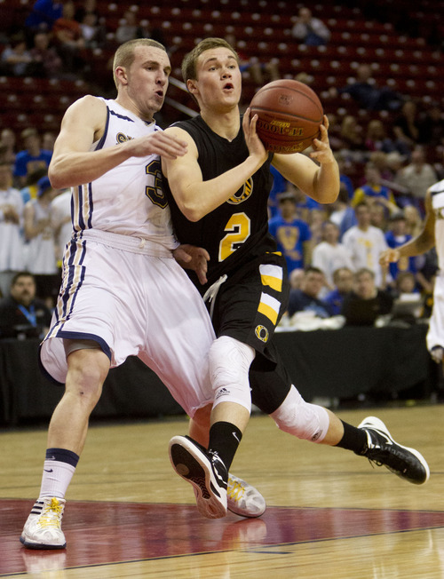 Trent Nelson  |  The Salt Lake Tribune
Orem's Zach Hunsaker brings the ball downcourt with Skyline's Clint Berhow defending. Orem vs. Skyline, 4A High School Basketball Championships Wednesday, February 29, 2012 at the Maverik Center in West Valley City, Utah.