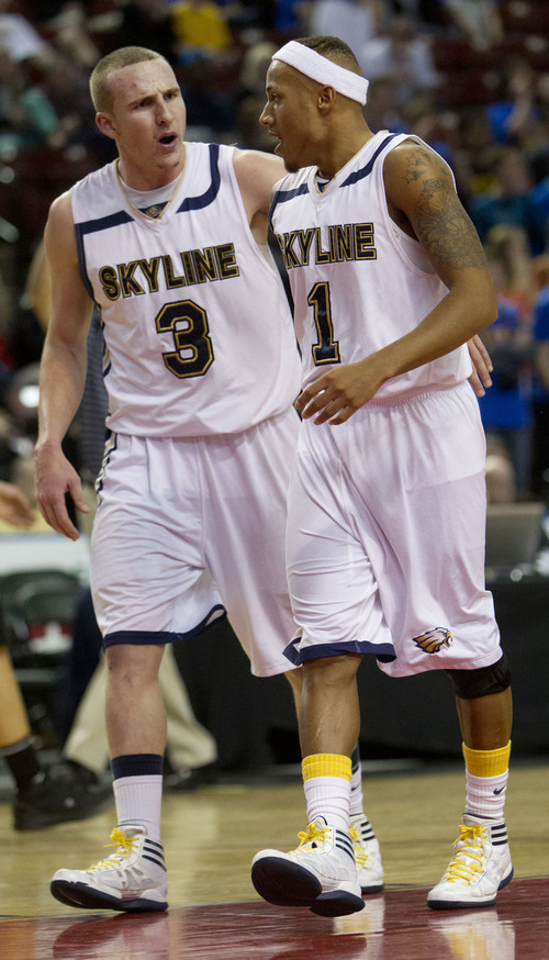 Trent Nelson  |  The Salt Lake Tribune
Skyline's Clint Berhow (3) congratulates teammate Desean Miller after Miller caused an Orem turnover. Orem vs. Skyline, 4A High School Basketball Championships Wednesday, February 29, 2012 at the Maverik Center in West Valley City, Utah.