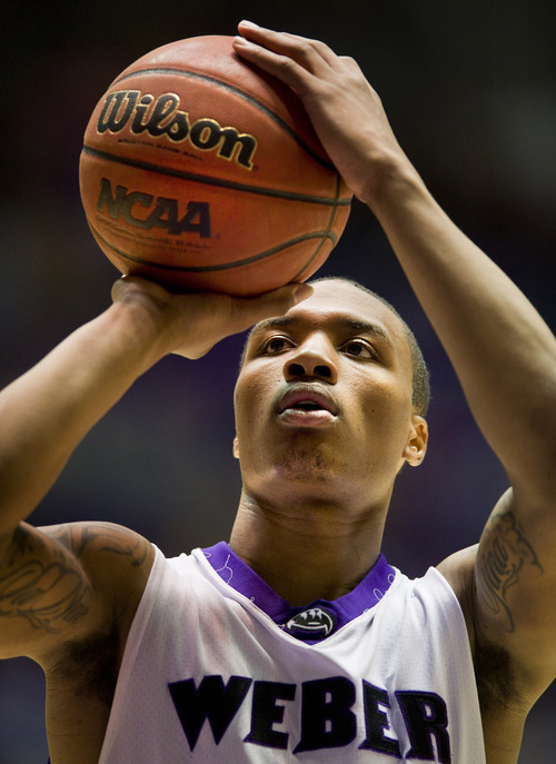 Weber State Wildcats guard Damian Lillard (1) shoots against the Montana Grizzlies during the first half in the Dee Events Center. (© 2012 Douglas C. Pizac/Special to The Tribune)