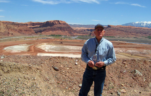 JUDY FAHYS  |  The Salt Lake Tribune
Atlas tailings project manager Don Metzler, with the Department of Energy, stands in front of the site near Moab where millions of tons of uranium waste have been removed. A new contract went to an Idaho company to take over from EnergySolutions Inc. And Rep. Jim Matheson said he is concerned that a scale-back in funding will slow down the project.