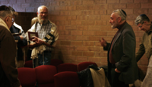 Scott Sommerdorf  |  The Salt Lake Tribune             
Cantor Laurence Loeb (second from right), speaks to a group of men after service on Feb. 19, 2012. Loeb is celebrating 50 years as a cantor this year, including 33 at Kol Ami.