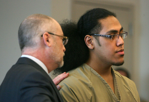 Steve Griffin  |  The Salt Lake Tribune

Attorney  Richard Van Wagoner puts his hand on his client, Hunter Farani, as he pleads guilty to two counts of aggravated kidnapping and one count of aggravated murder for the murder of 18-year-old JoJo Lee Brandstatt in 2009, during a change of plea hearing at the Matheson Courthouse in Salt Lake City, Utah  Thursday, March 8, 2012.  Farani was barely 14 when he shot Brandstatt for wearing the color of a rival gang.