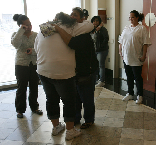 Steve Griffin  |  The Salt Lake Tribune

Seneuefa Farani, left, and Elka Fernandez, cry as they embrace outside Judge William Barrett's courtroom following a change of plea hearing at the Matheson Courthouse in Salt Lake City, Utah Thursday, March 8, 2012.  Hunter Farani, Seneuefa's, son, plead guilty to two counts of aggravated kidnapping and one count of aggravated murder for the murder of Fernandez's son, 18-year-old JoJo Lee Brandstatt in 2009.  Farani was barely 14 when he shot Brandstatt for wearing the color of a rival gang.