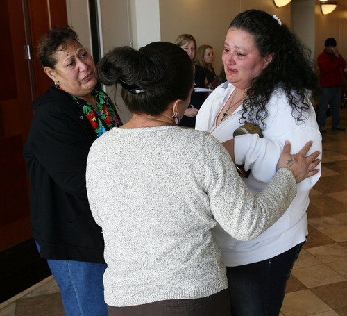 Steve Griffin  |  The Salt Lake Tribune

Seneuefa Farani, left, and Elka Fernandez are consoled outside  Judge William Barrett's courtroom following a change of plea hearing at the Matheson Courthouse in Salt Lake City, Utah Thursday, March 8, 2012.  Hunter Farani, Seneuefa's, son, plead guilty to two counts of aggravated kidnapping and one count of aggravated murder for the murder of Fernandez's son, 18-year-old JoJo Lee Brandstatt in 2009.  Farani was barely 14 when he shot Brandstatt for wearing the color of a rival gang. The women embraced and held each other as they cried following the hearing.