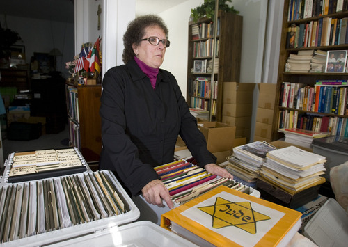Tribune file photo
Helen Radkey is a researcher who has publicized the LDS Church's proxy baptisms of Holocaust victims and Catholic Saints. In this 2009 photograph, she goes through some of her numerous boxes of research files on the baptisms that take up part of an extra bedroom in her home.
