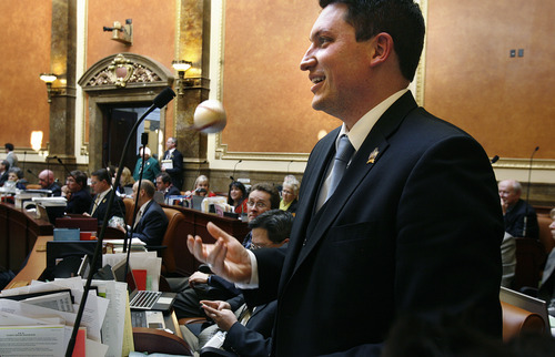 Scott Sommerdorf  |  The Salt Lake Tribune             
Rep. Ryan Wilcox, R-Ogden, tosses a baseball while speaking about his bill, HB354 - Alcoholic Beverage Amendments, in the Utah House of Representatives Thursday.