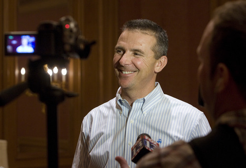 Scott Sommerdorf  |  The Salt Lake Tribune             
New Ohio State football coach Urban Meyer listens to a question during a press availability prior to speaking to the AGC Intermountain Growth Conference at the Grand America, Thursday, March 9, 2012.