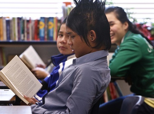 Leah Hogsten  |  The Salt Lake Tribune
Although KaPaw Htoo is thought to be the first refugee at Wasatch High School, two fellow Karen refugees recently joined him, Thaw Wai Htoo, 15, left, and Moo Eh Htoo, 15, right. The three share a study hall period for English language learners.