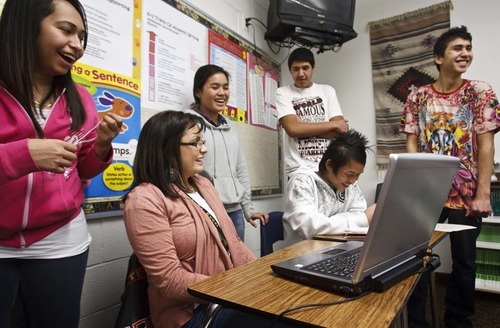 Leah Hogsten  |  The Salt Lake Tribune

KaPaw Htoo, 16, laughs as his classmates and instructional aide Wendy Sharp react to the news that KaPaw Htoo ate spiders and snakes when he lived in a refugee camp in Thailand. KaPaw Htoo, a Karen refugee, moved to Heber's Wasatch High in November after first attending Cottonwood High in Murray. 

KaPaw Htoo laughs to himself Friday, February 10, 2012 at the reactions of his classmates and English as a Second Language aide Wendy Sharp as he shares a personal story of catching and eating spiders and snakes while living in a refugee camp in Thailand.  
 KaPaw Htoo, 16, is a Karen refugee from a Thailand refugee camp and arrived in Utah in June 2011 with his parents, sister and three brothers. KaPaw Htoo began attending Wasatch High School in November. He and his family do not speak English and are all learning English through schooling and adult ESL classes.