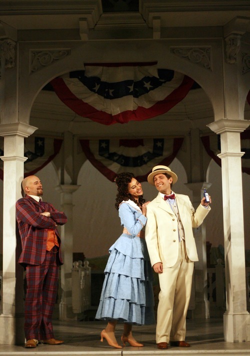Kim Raff  |  The Salt Lake Tribune
(middle) Anya Matanovic, playing Adina, (right)  Aaron Blake, playing Nemorino and  (left) Rod Nelman, playing Dulcamara, pose during a preview for Utah Opera's production of 