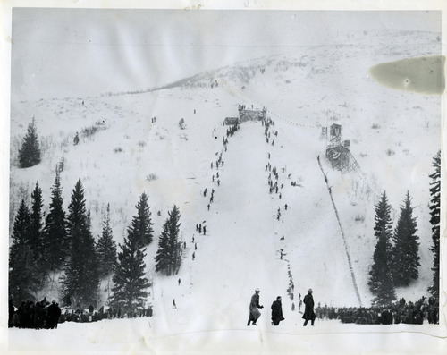 Tribune file photo

People watch the National Amateur Ski Tournament at Ecker Hill on Feb. 21, 1937. The venue was a world class ski jumping venue and hosted a number of high profile competitions in the 1930s and 1940s.